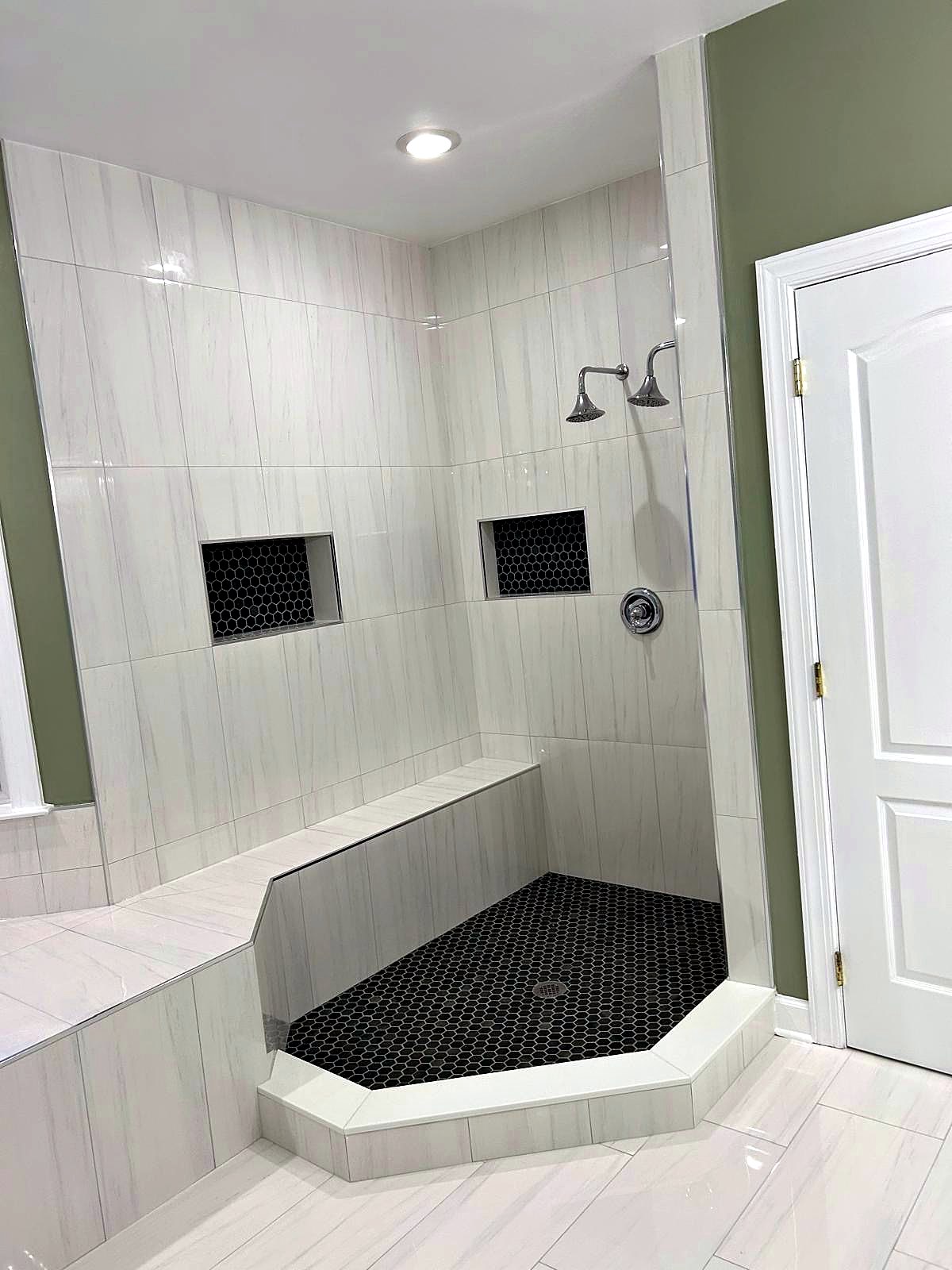 Walk-in shower with built-in tile bench